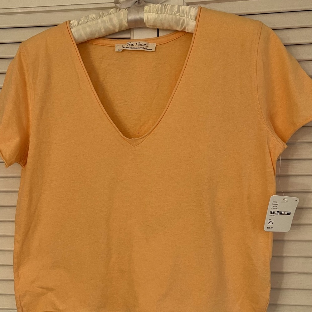 NWT “We The Free” short sleeve v-neck t shirt. XS